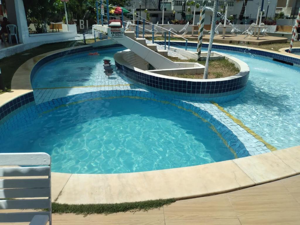 Piscina en o cerca de Flat em Itamaracá