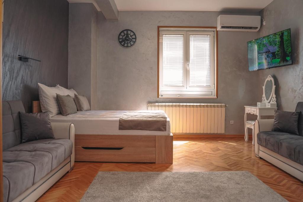 Voodi või voodid majutusasutuse Dukat Apartmani-Studio toas