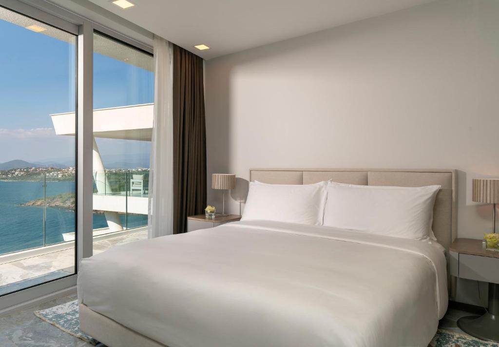 Postel nebo postele na pokoji v ubytování Le Méridien Bodrum Beach Resort
