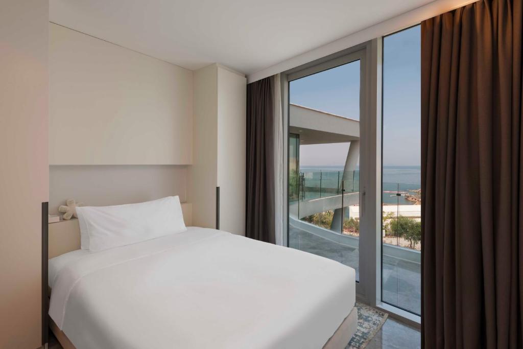 Postel nebo postele na pokoji v ubytování Le Méridien Bodrum Beach Resort