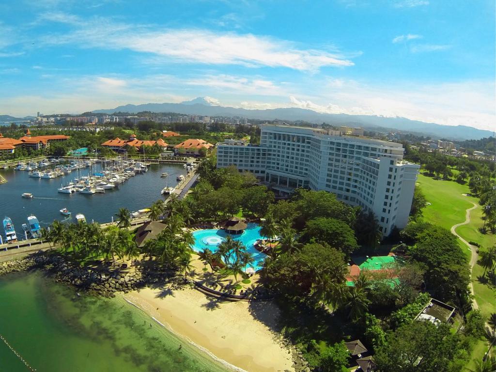 an aerial view of a hotel and a marina at The Pacific Sutera in Kota Kinabalu