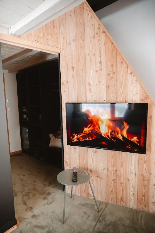 TV a/nebo společenská místnost v ubytování Horská Chata pod Soliskom