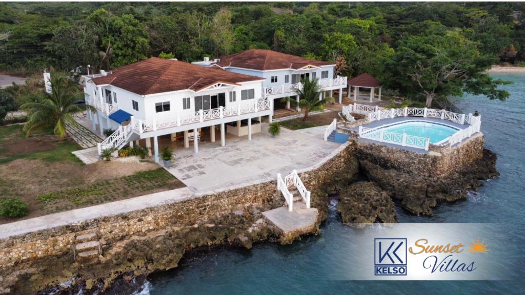 an aerial view of a house in the water at Kelso Sunset Villas in Lucea