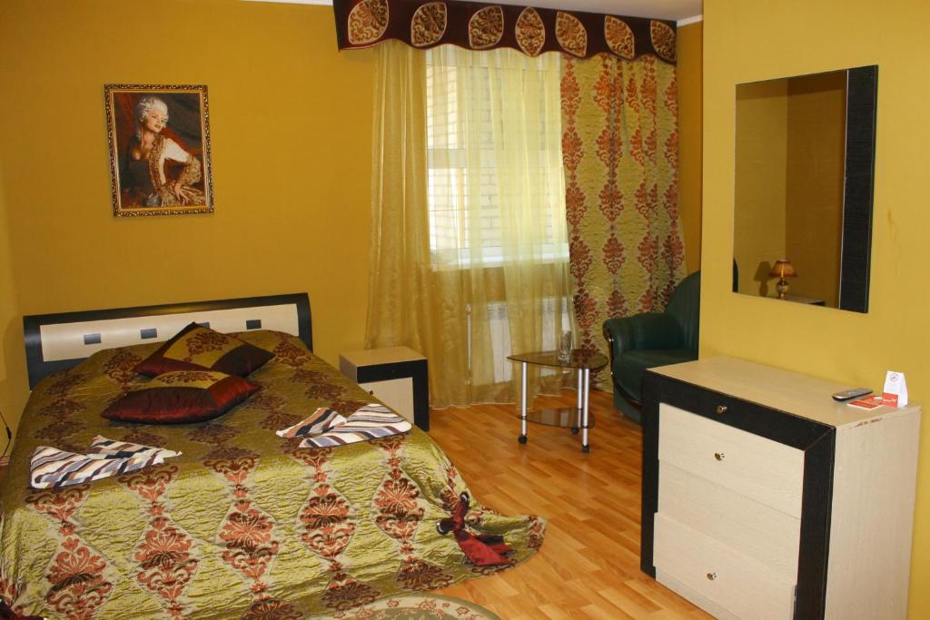 Кровать или кровати в номере Dudinka - City Mini Hotel
