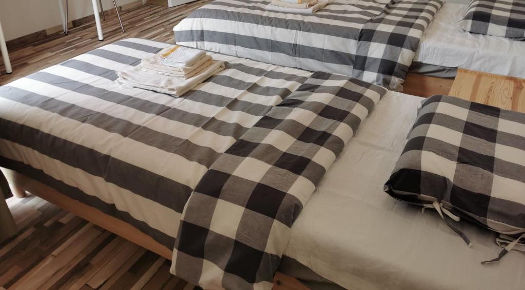 Posteľ alebo postele v izbe v ubytovaní Duna Riverside