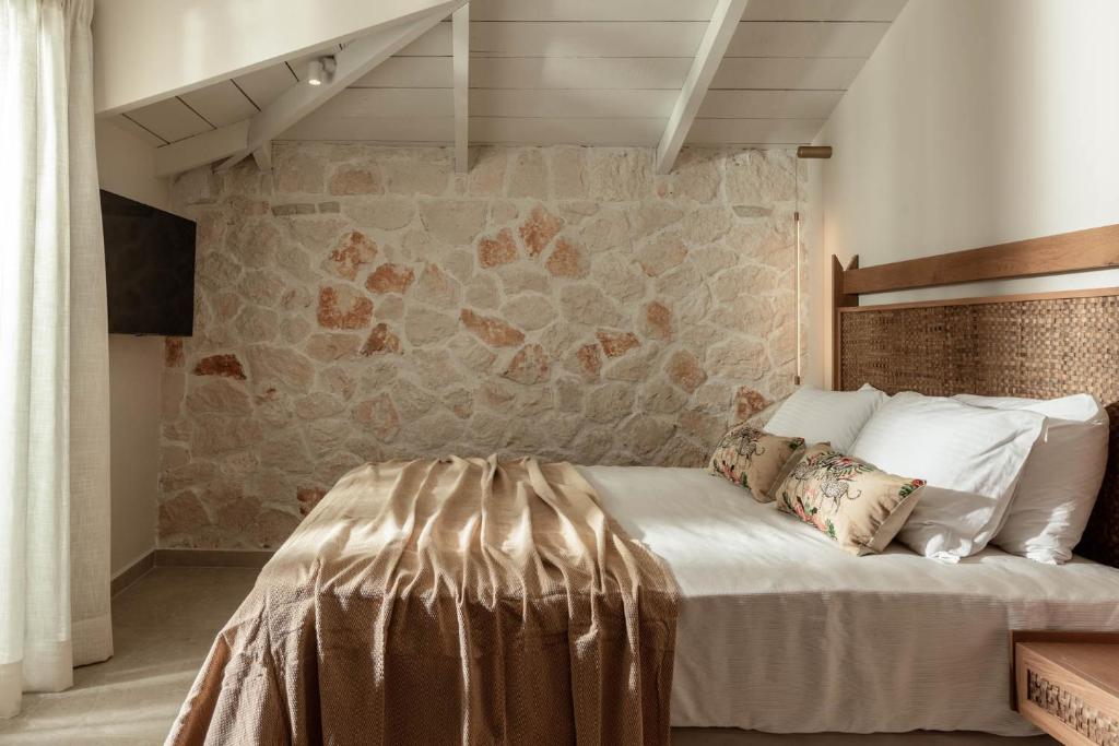 Postel nebo postele na pokoji v ubytování Porta del mar Beach Resort