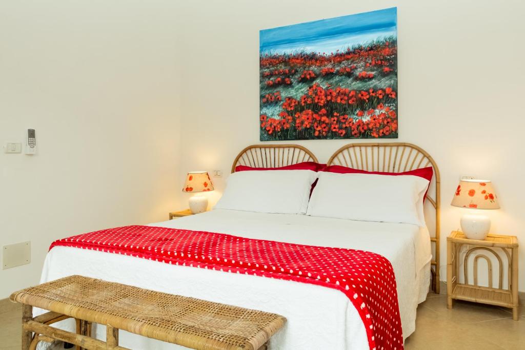 Postel nebo postele na pokoji v ubytování Bed And Breakfast Le Azalee