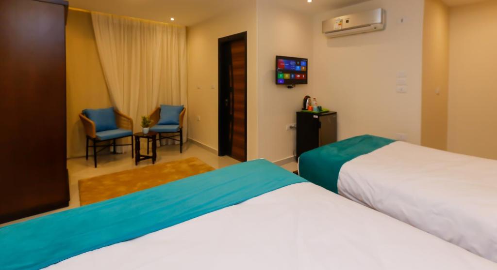 Letto o letti in una camera di Diamond Pyramids View Inn