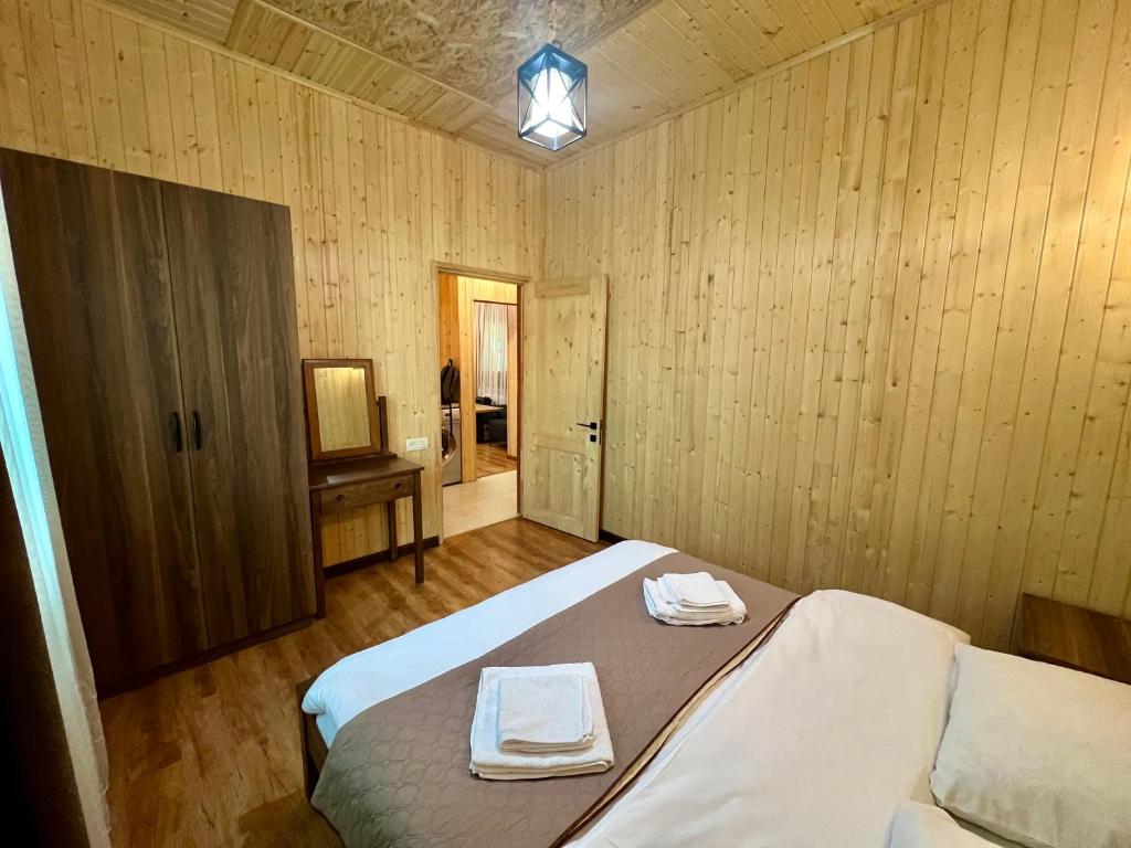 Postel nebo postele na pokoji v ubytování Milenium magic villas on Sevan beach