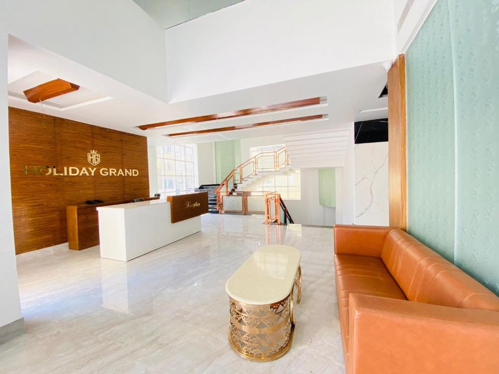 Posezení v ubytování Hotel Holiday Grand