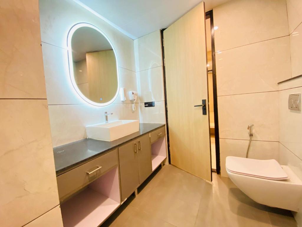 Koupelna v ubytování Hotel Holiday Grand