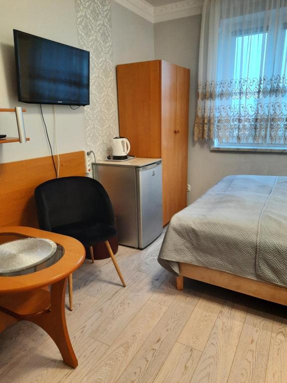 Posteľ alebo postele v izbe v ubytovaní Willa Kamako