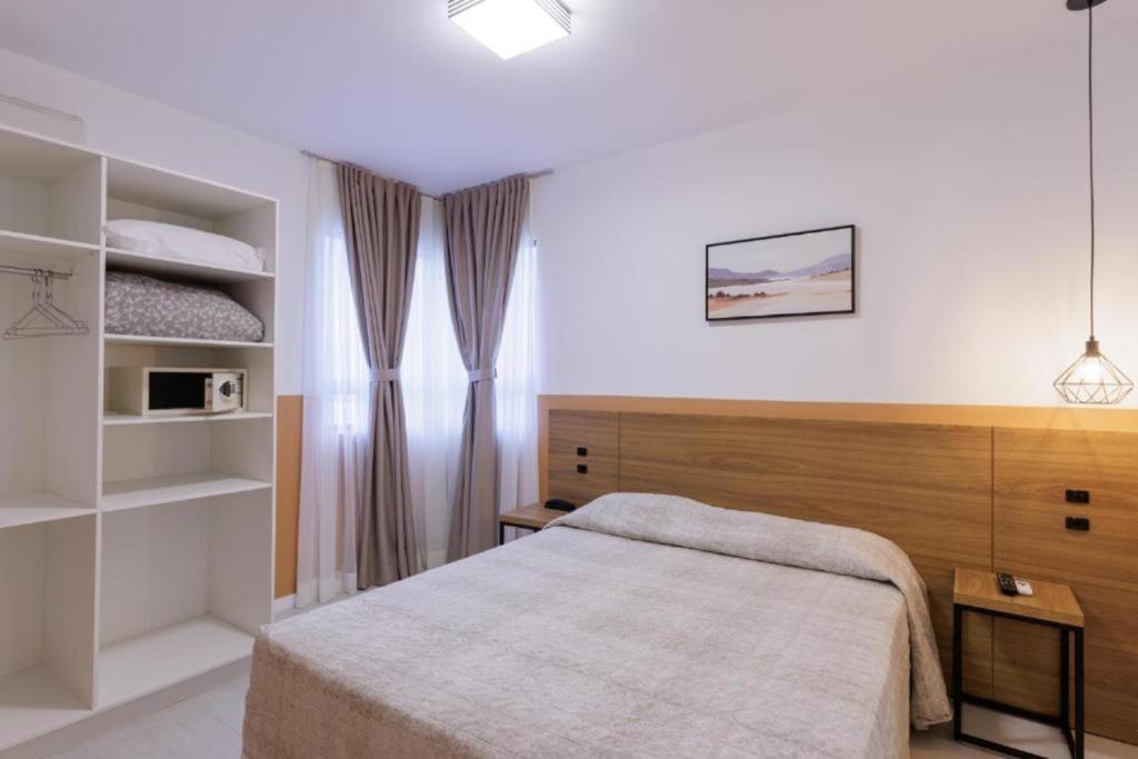 Le Village Flats e Hotel - Apartamento Deluxe