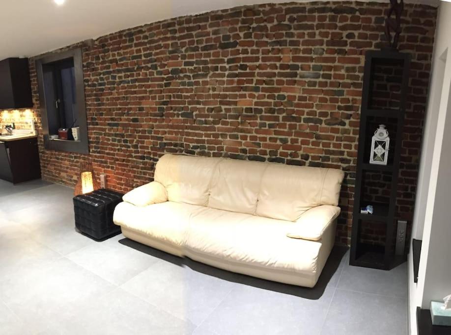Posezení v ubytování Duplex style industriel à deux pas de la Place