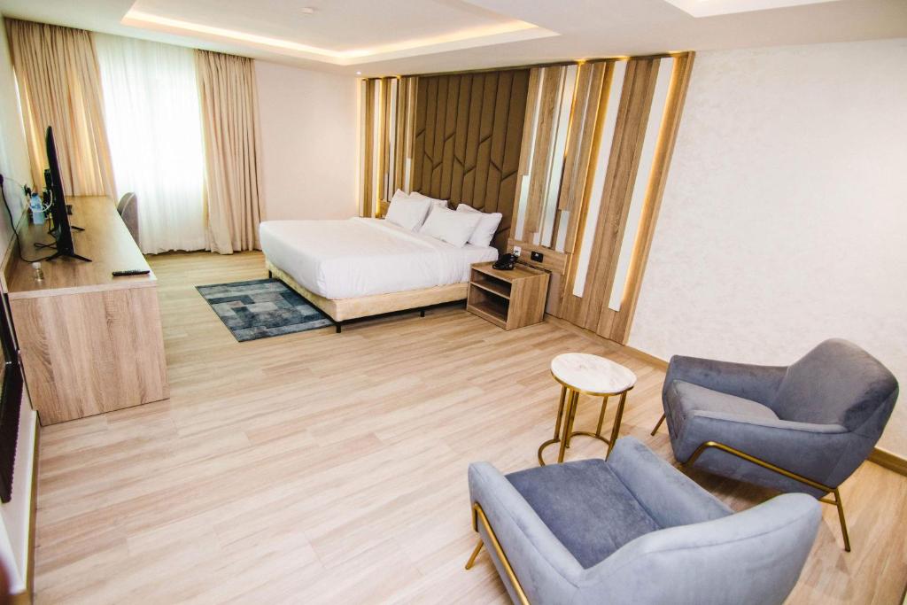 Voodi või voodid majutusasutuse The Safron Hotel toas