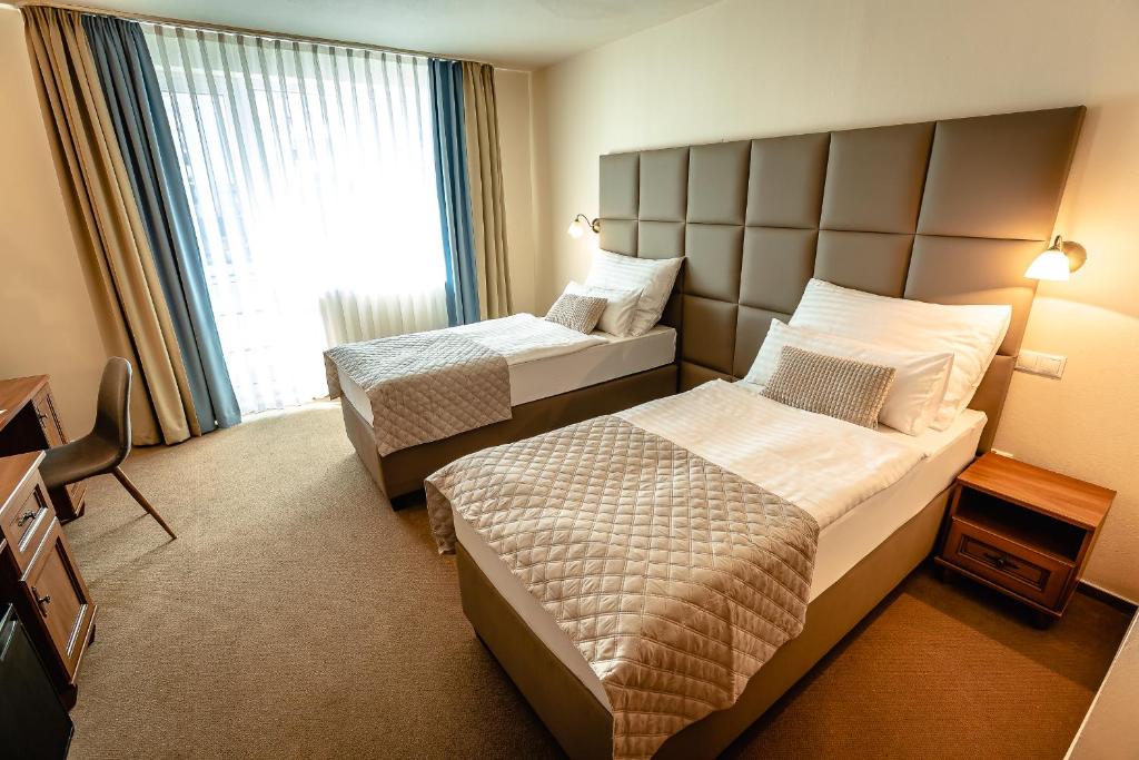 Postel nebo postele na pokoji v ubytování Dixon Resort