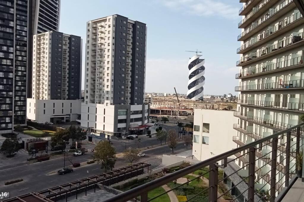 a view of a city with tall buildings at Departamento nuevo en High Towers Elite, Sonata in Lomas de Angelopolis