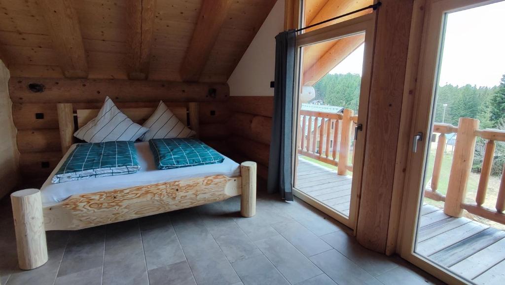 Postel nebo postele na pokoji v ubytování Böhmerwald Lodges
