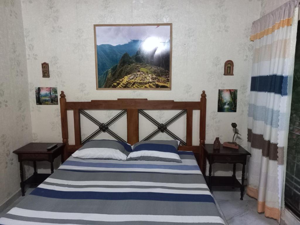 Postel nebo postele na pokoji v ubytování La Petite Maison de Diana