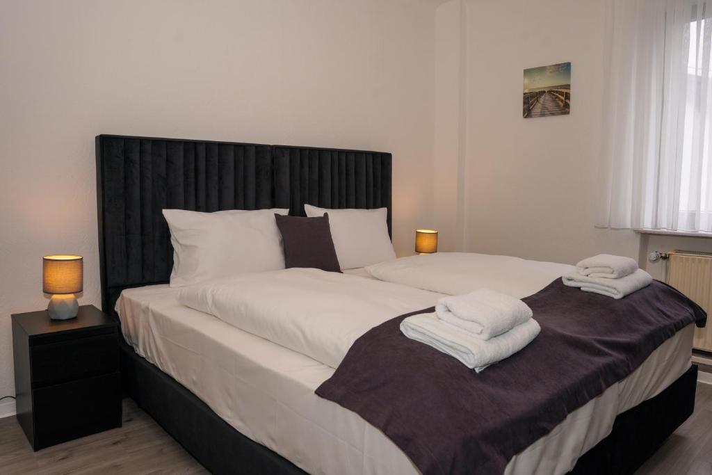 Postel nebo postele na pokoji v ubytování GN Hotel Furpach