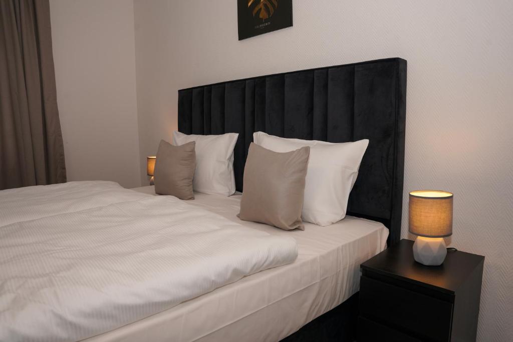 Postel nebo postele na pokoji v ubytování GN Hotel Furpach