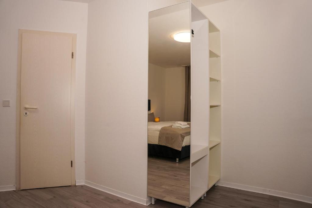 Postel nebo postele na pokoji v ubytování GN Hotel Furpach