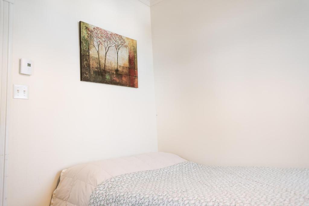 Postel nebo postele na pokoji v ubytování Auberge Incroyable