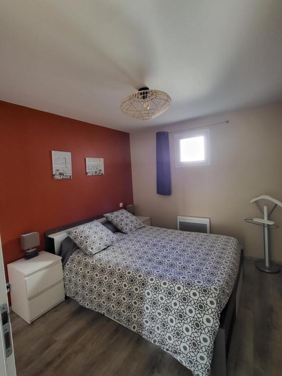 Postel nebo postele na pokoji v ubytování LE TOURISTIC Appartements