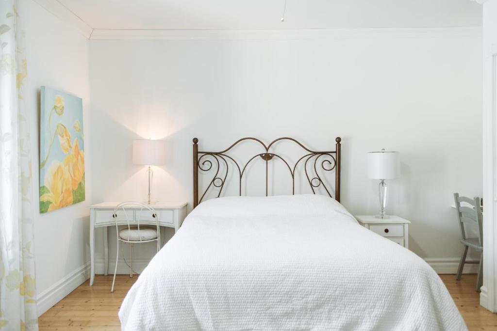 Postel nebo postele na pokoji v ubytování Auberge Incroyable