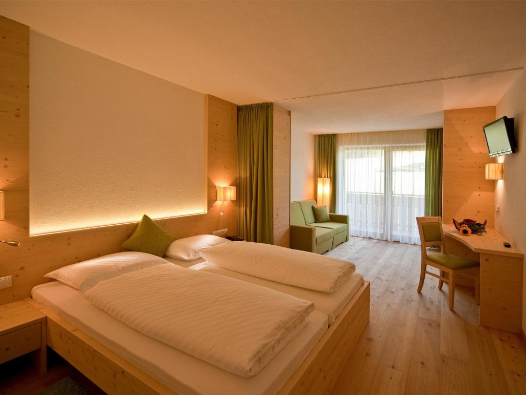 TV a/nebo společenská místnost v ubytování Hotel Foestlerhof