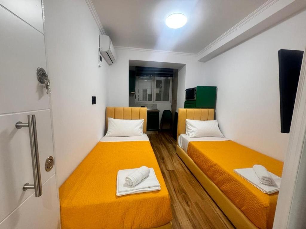 Posteľ alebo postele v izbe v ubytovaní Keli’s apartment