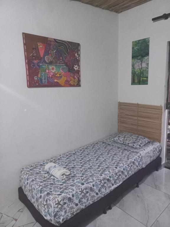 Postel nebo postele na pokoji v ubytování La Petite Maison de Diana