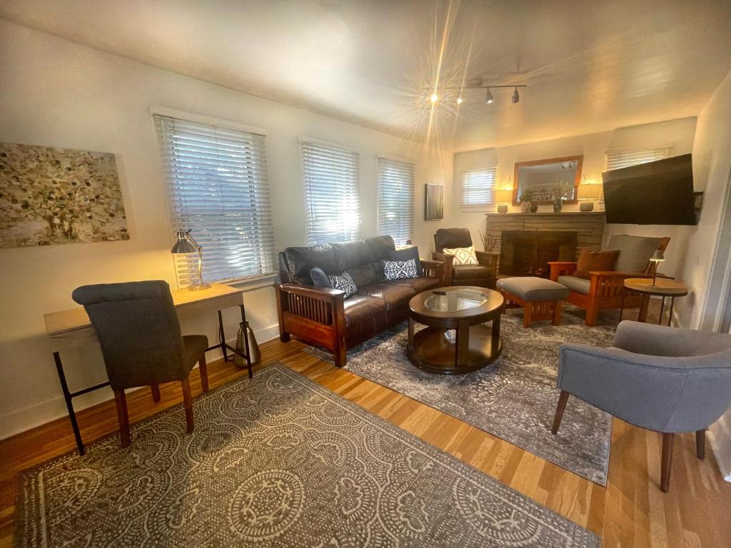 a living room with a couch and a table at Bogus Property in Salt Lake City