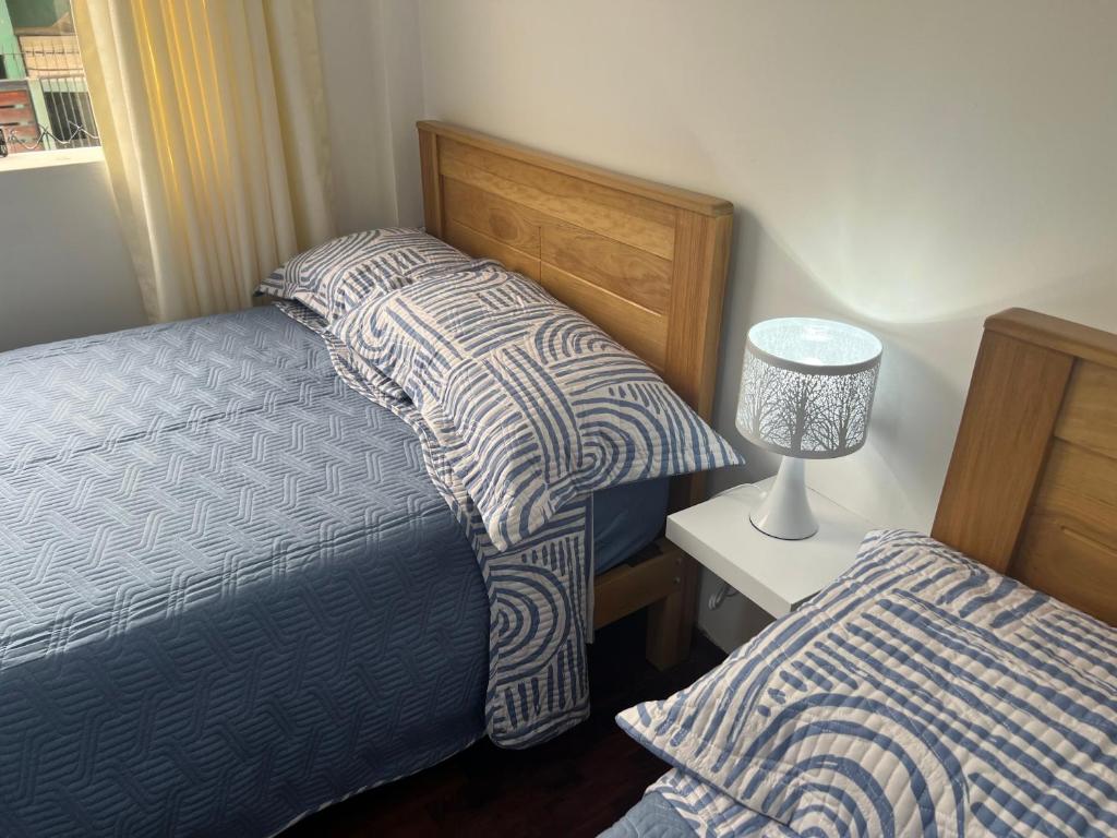 Postel nebo postele na pokoji v ubytování San Miguel, lindo depa, 3 camas, internet y cable