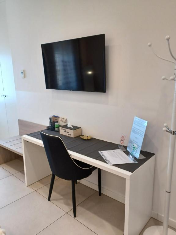 TV a/nebo společenská místnost v ubytování HOME CARPEDIEM
