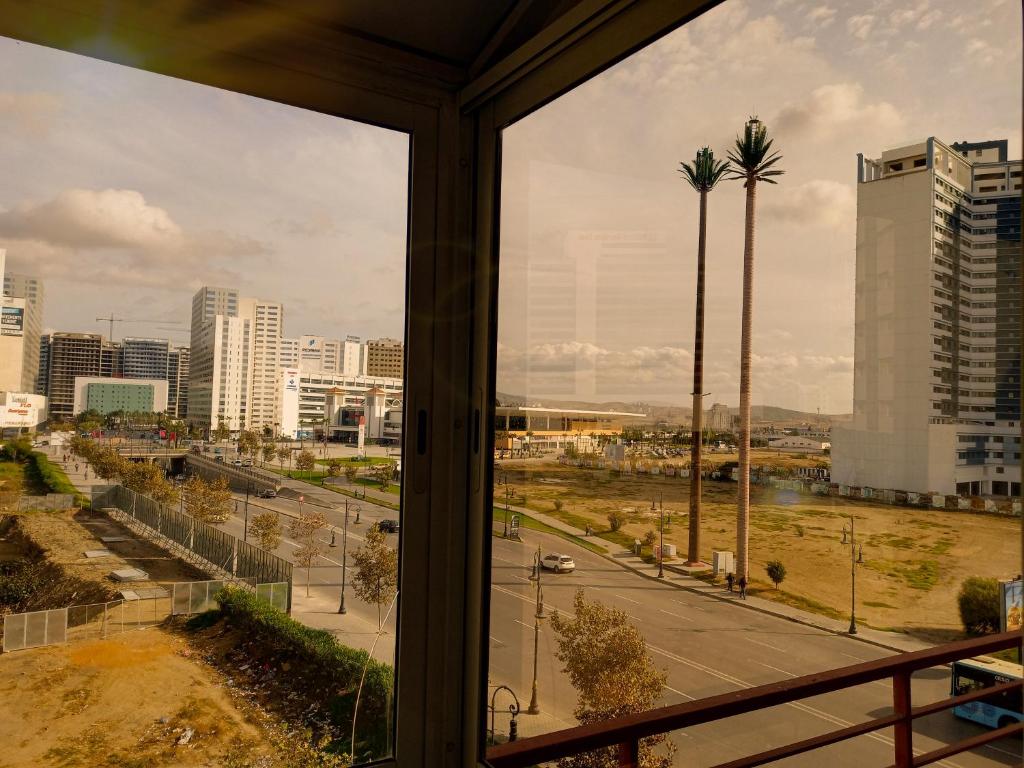 a view of a city from a window at NOUVEAU Appartement au plein centre ville en face Hilton M2 in Tangier