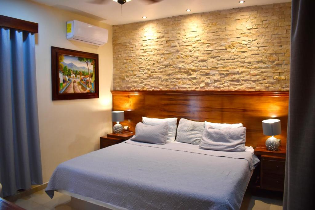 Postel nebo postele na pokoji v ubytování El Zaguán Colonial by GuruHotel