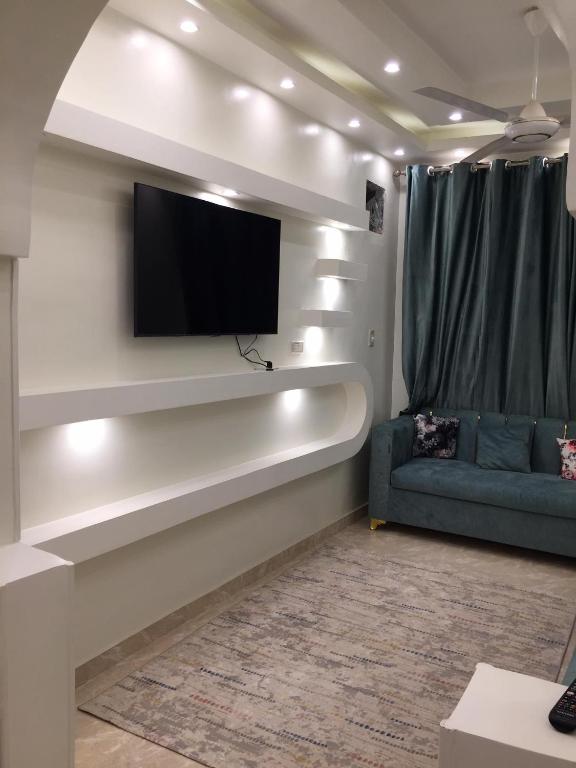 TV a/nebo společenská místnost v ubytování Babylon guesthouse