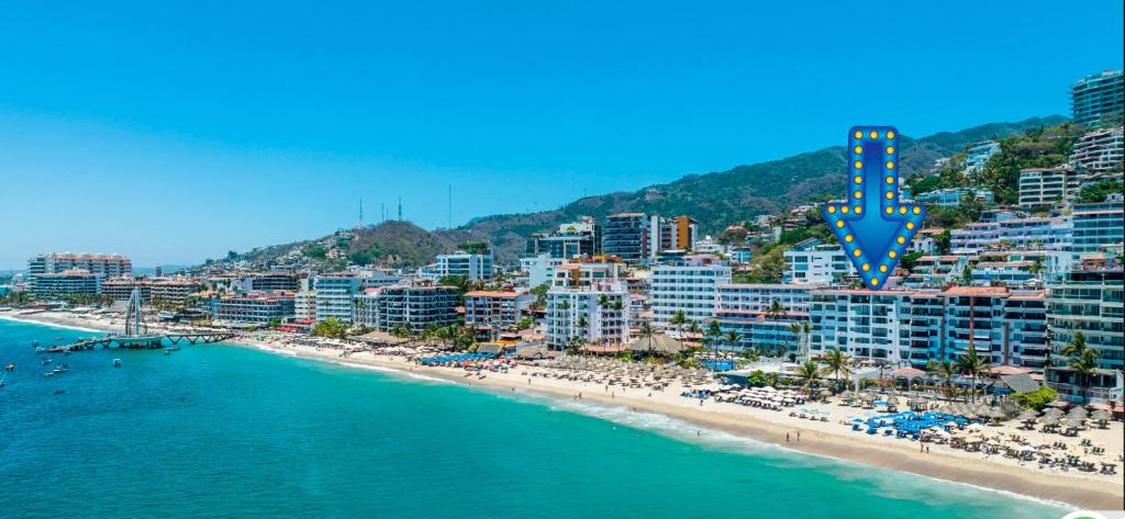 een luchtzicht op een strand en een stad bij one beach street hotel -Beach front Spacious 1BD 1BA fabulous view in Zona Romantic Puerto Vallarta in Puerto Vallarta