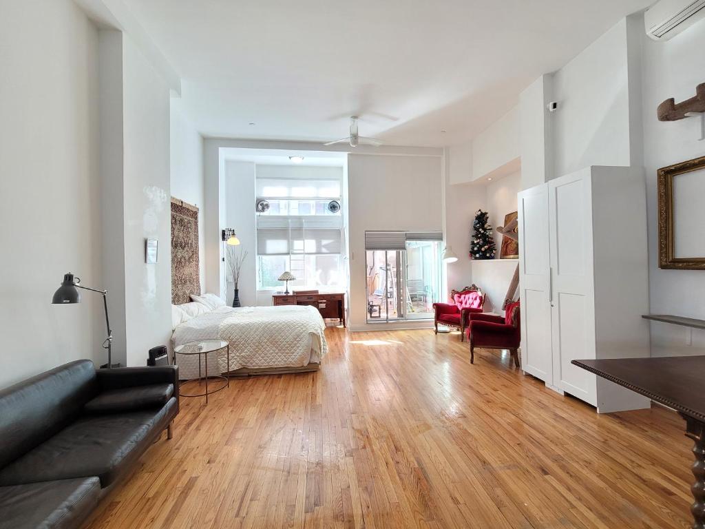 Postel nebo postele na pokoji v ubytování Duplex New York loft