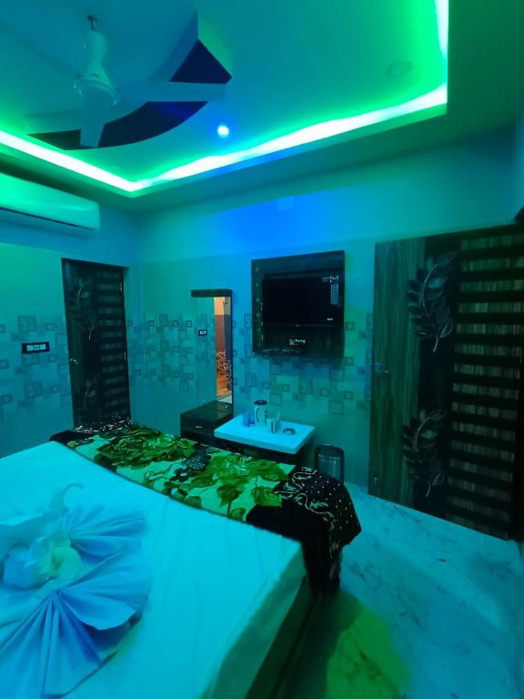 Postel nebo postele na pokoji v ubytování Hotel Paradise