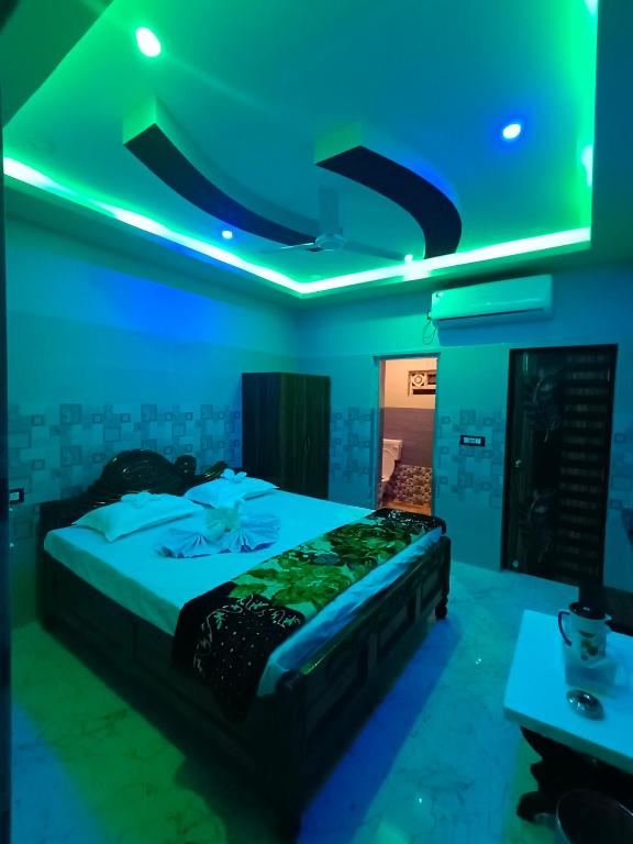 Postel nebo postele na pokoji v ubytování Hotel Paradise