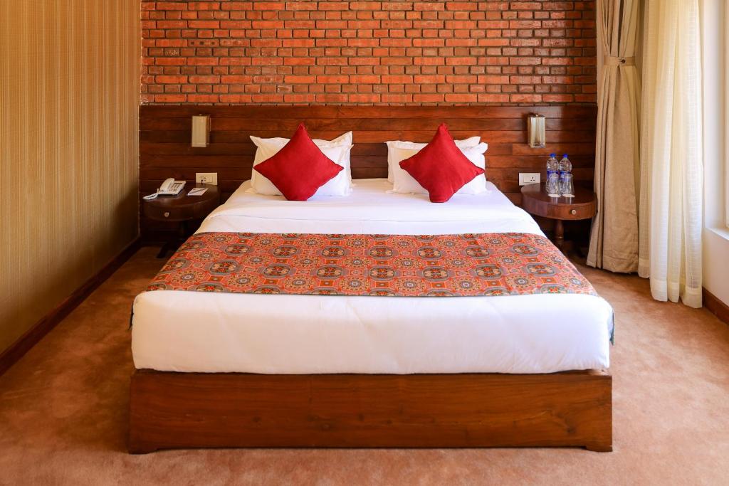 Voodi või voodid majutusasutuse Hotel Dolmaling toas