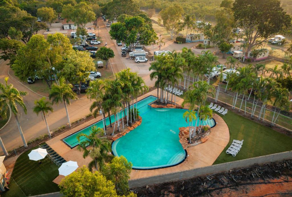 an overhead view of a swimming pool at a resort at Broome Caravan Park in Broome
