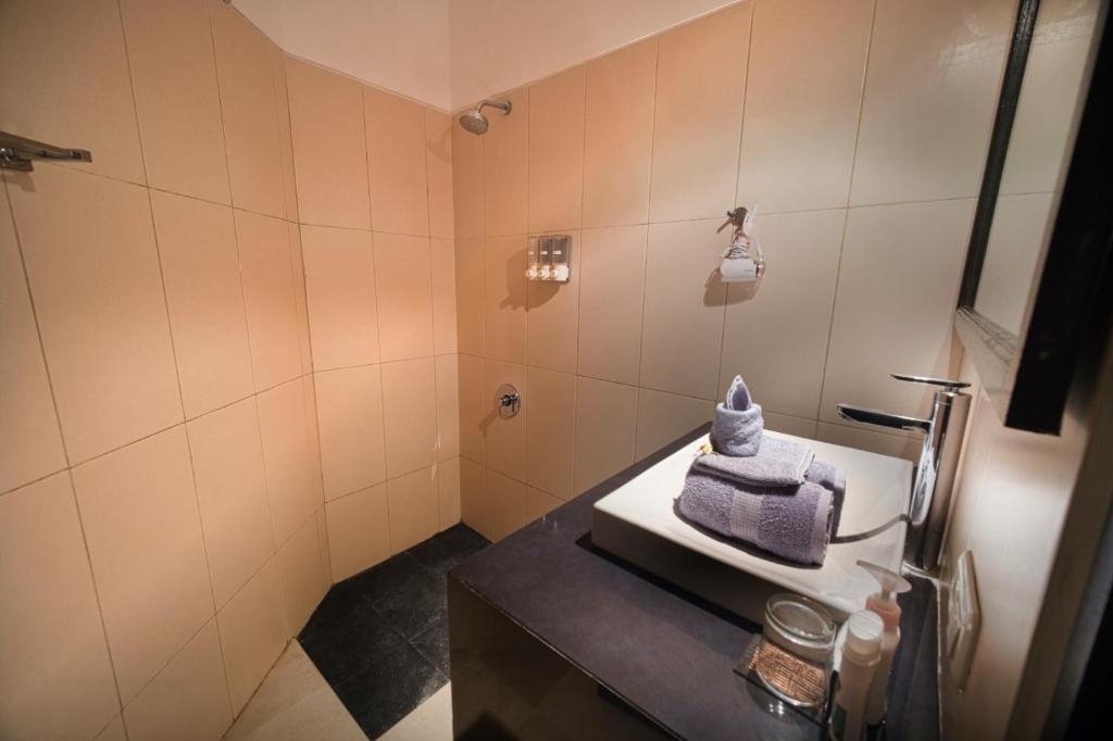 Letto o letti in una camera di Sing Sing Resort Lovina