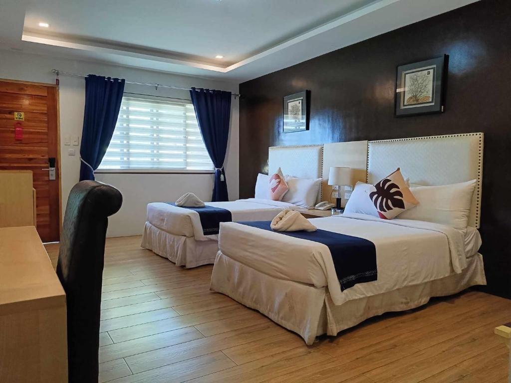 Postel nebo postele na pokoji v ubytování Marand Beach Resort