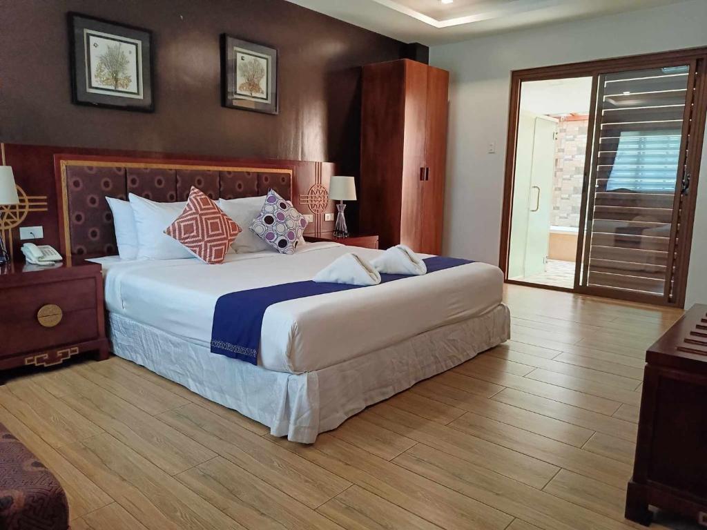 Postel nebo postele na pokoji v ubytování Marand Beach Resort