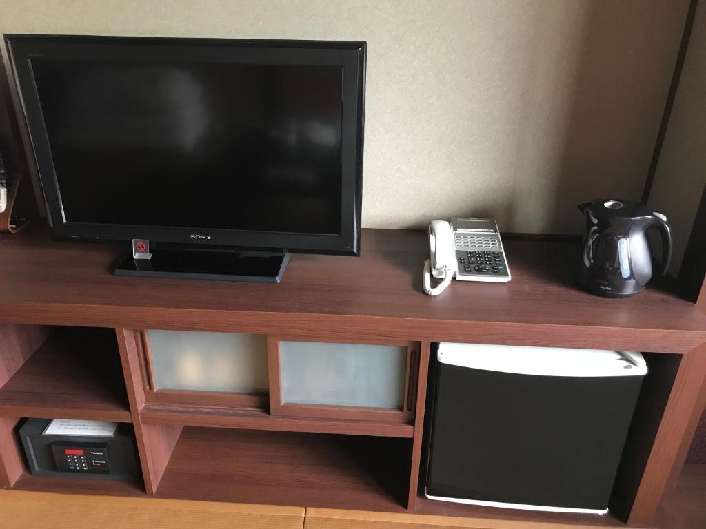 TV a/nebo společenská místnost v ubytování Tokiwa Ryokan