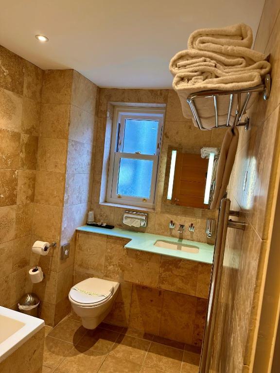Koupelna v ubytování Prom Hotel