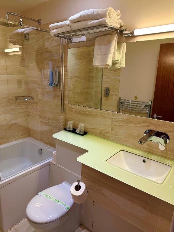 Koupelna v ubytování Prom Hotel